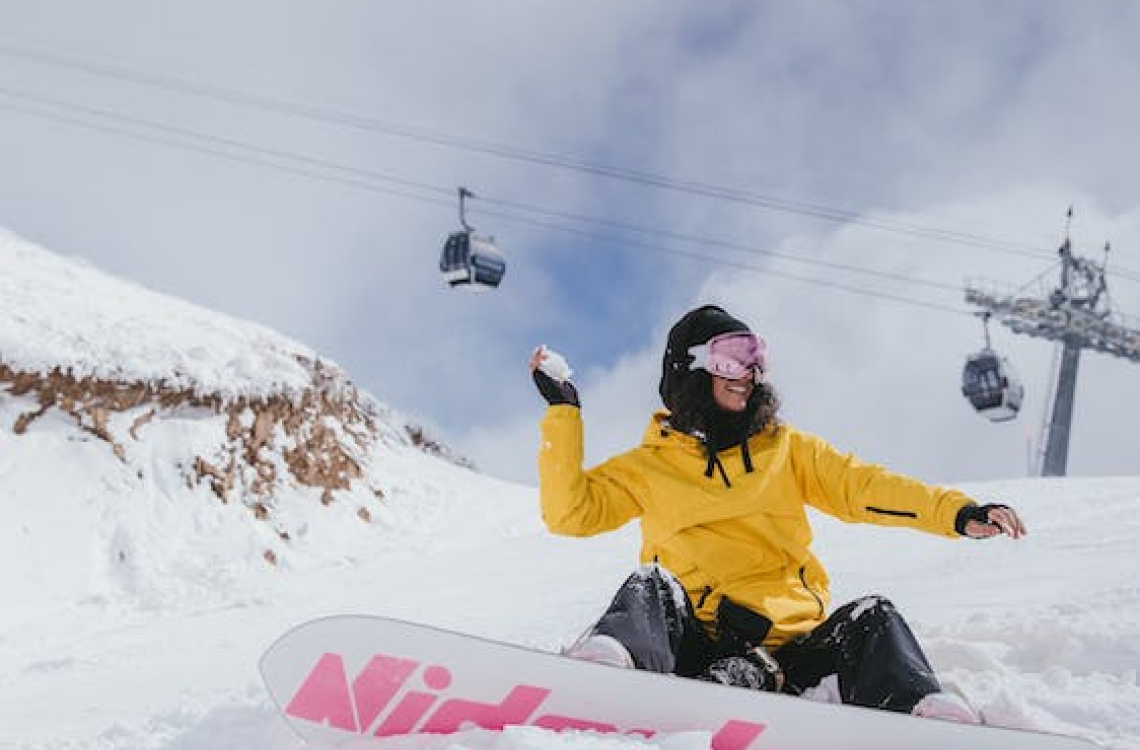Snow activities and ski enthusiasts enjoying a winter day at Mt. Buller