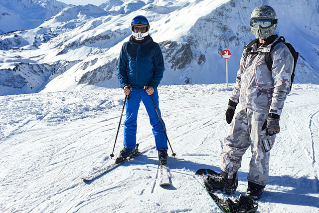Snow activities and ski enthusiasts enjoying a winter day at Mt. Buller.